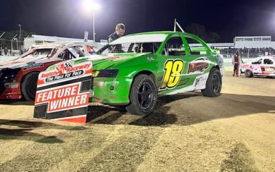 RIECK REAPS REWARDS FOR MODIFIED SEDANS WHILE A TIME CONSUMING PILEUP IN THE A MAIN BRINGS ON CURFEW RESTRAINTS